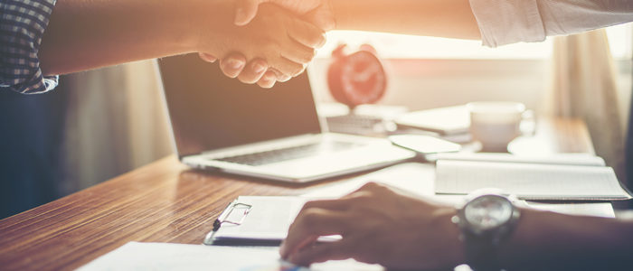 Business People Handshake Greeting Deal at work.